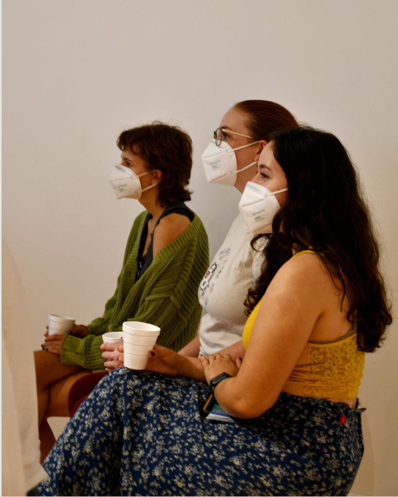 3 students sipping tea