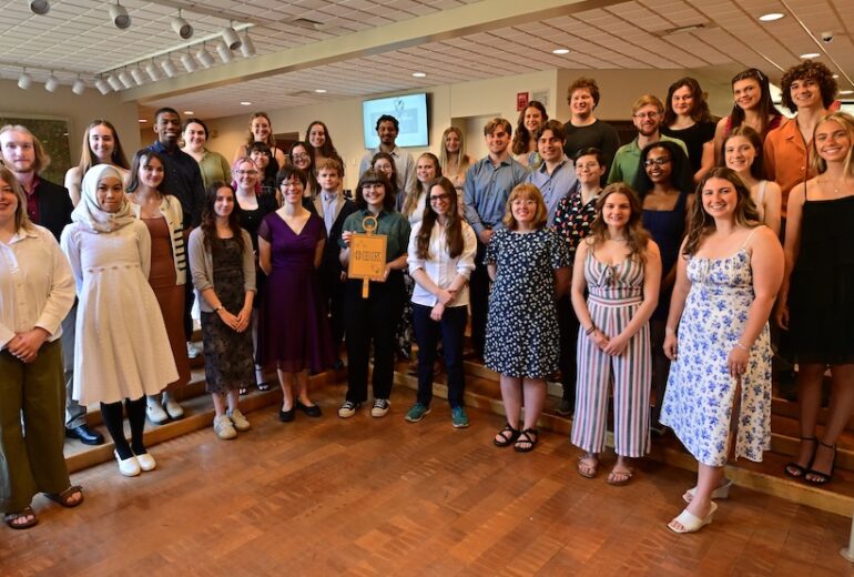 2025 PBK Inductees smiling at the camera in Scheide Music Center