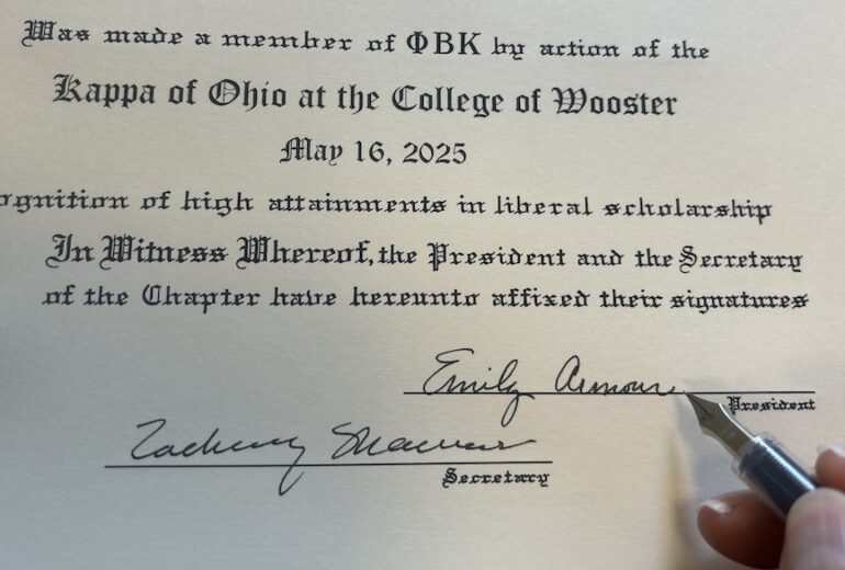 a closeup photograph of a paper PBK certificate with May 16, 2025