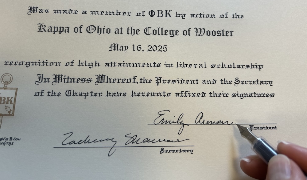 a closeup photograph of a paper PBK certificate with May 16, 2025
