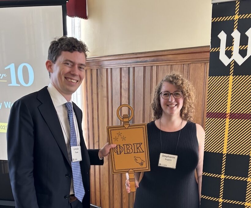 Lincoln Plews and Stephanie Sugars both ‘15 hold a PBK key in Kittredge Dining Hall