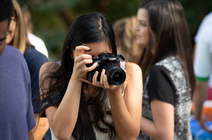 student taking pictures