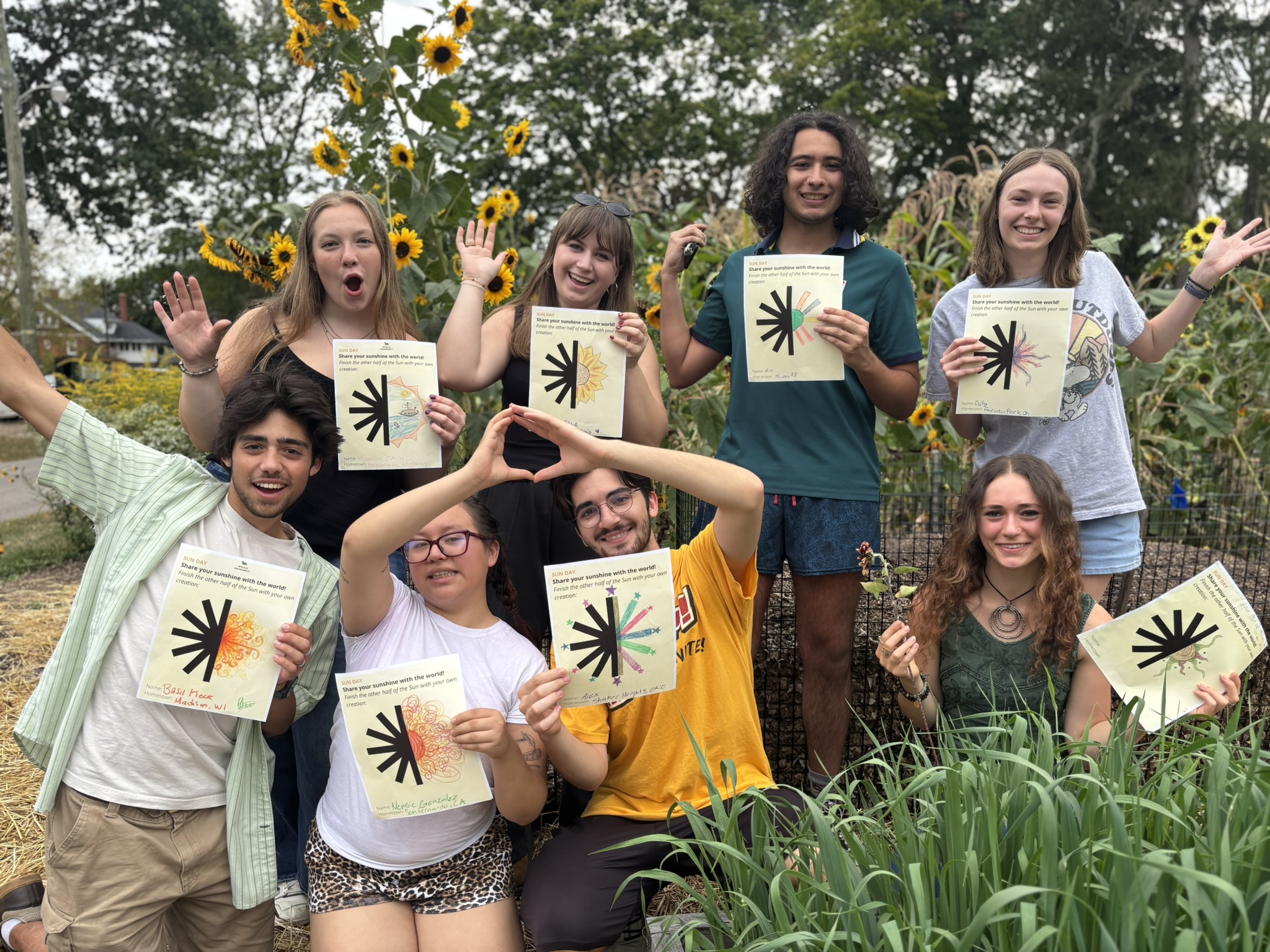 Students with sunflowers